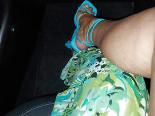 Mature stepmom with sexy legs in heels in the car with her younger stepson