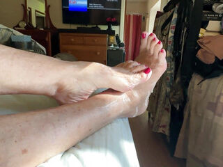 Mature Gives Handjob then gets Feet Covered In Cum