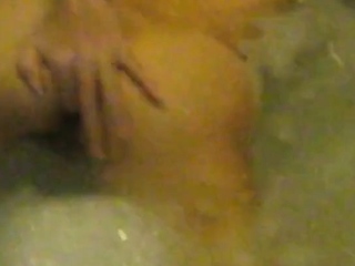 Jaripha Suticost fingers her own Anus in the bath
