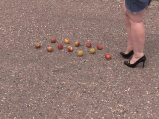 'Crush fetish outdoors Fat legs in high heel shoes crush apples'
