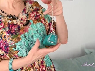 Minia Sniffs A Rose From Her Garden and Masturbates in Lacy Black Stockings