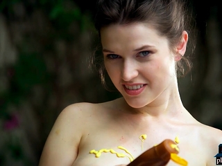 Hot bikini model Serena plays with mustard near a pool