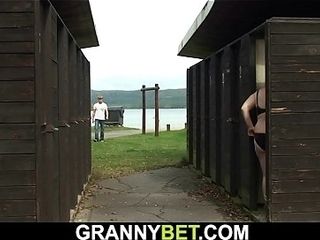 Blonde granny rides stranger&#039_s cock on public