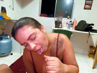 The naughty girl stopped cooking to suck my cock